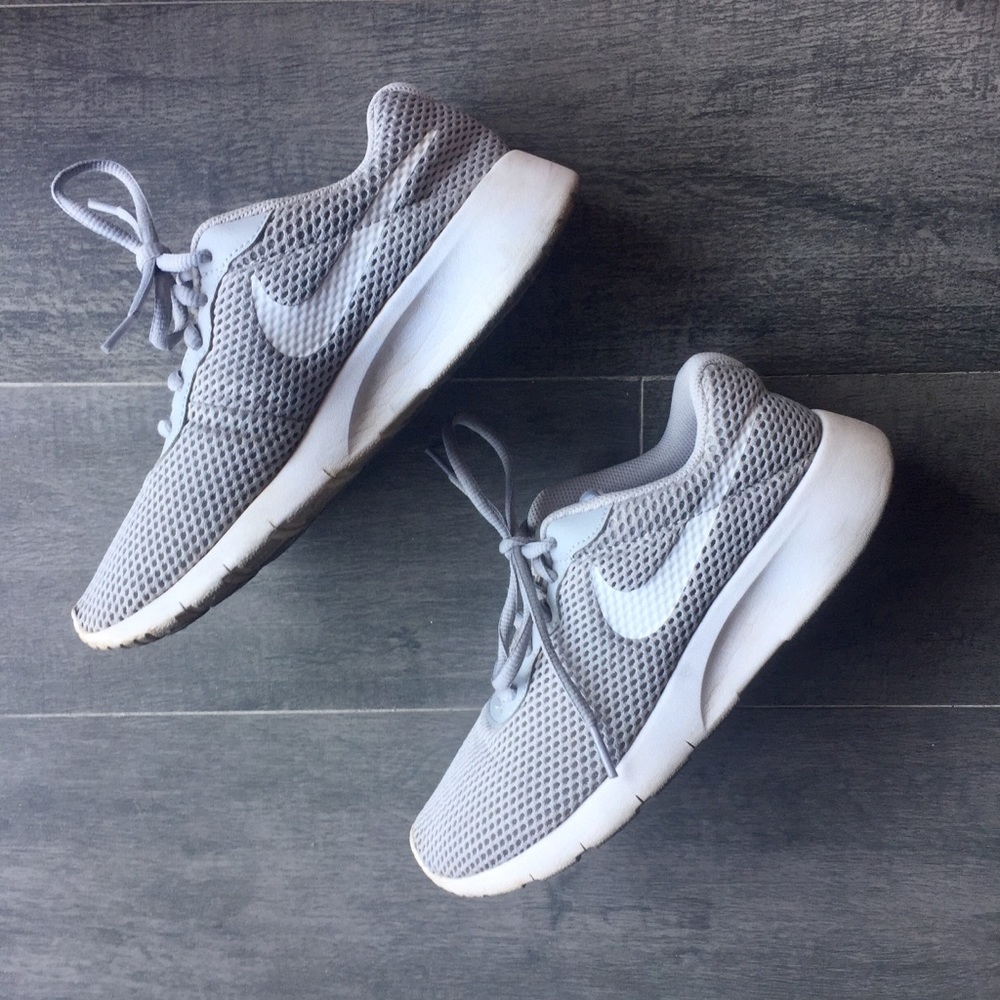 Grey and white nike shoes